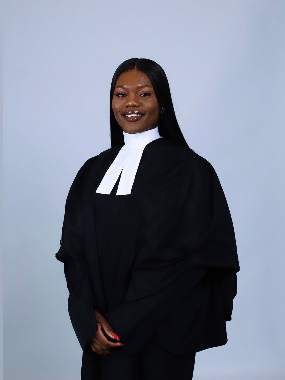 Portrait of Lelebari Blessing Nkpogone‑Mpigi (Lele) in court attire